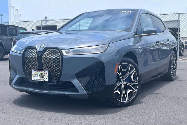 Used 2024 BMW iX xDrive50 w/ Premium Package AWD/4WD image 1