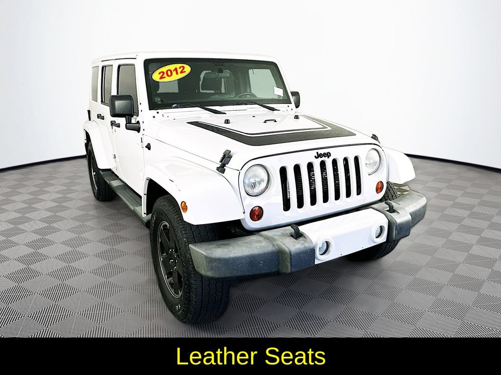 Used 2012 Jeep Wrangler Unlimited Sahara AWD/4WD video 3