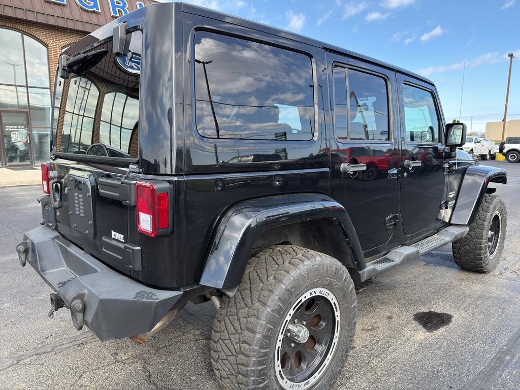 Used 2012 Jeep Wrangler Unlimited Sahara w/ Dual Top Group AWD/4WD image 7
