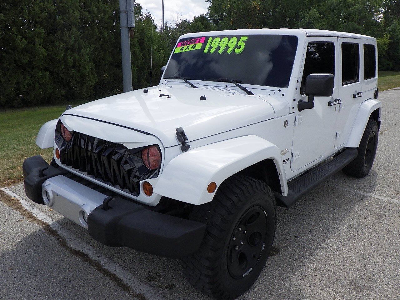 Used 2013 Jeep Wrangler Unlimited Sahara w/ Dual Top Group AWD/4WD image 1