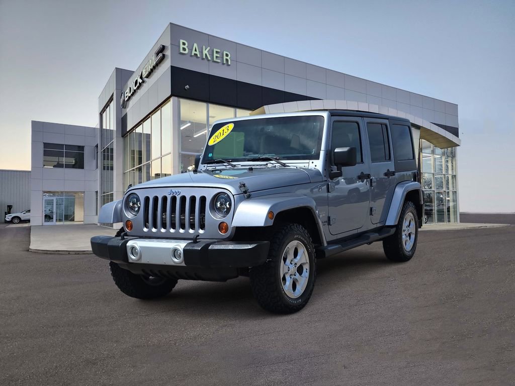 Used 2013 Jeep Wrangler Unlimited Sahara w/ Dual Top Group AWD/4WD image 1