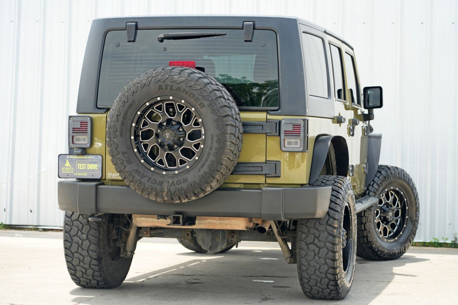 Used 2013 Jeep Wrangler Unlimited Sport w/ Mopar Black Appearance Group image 4