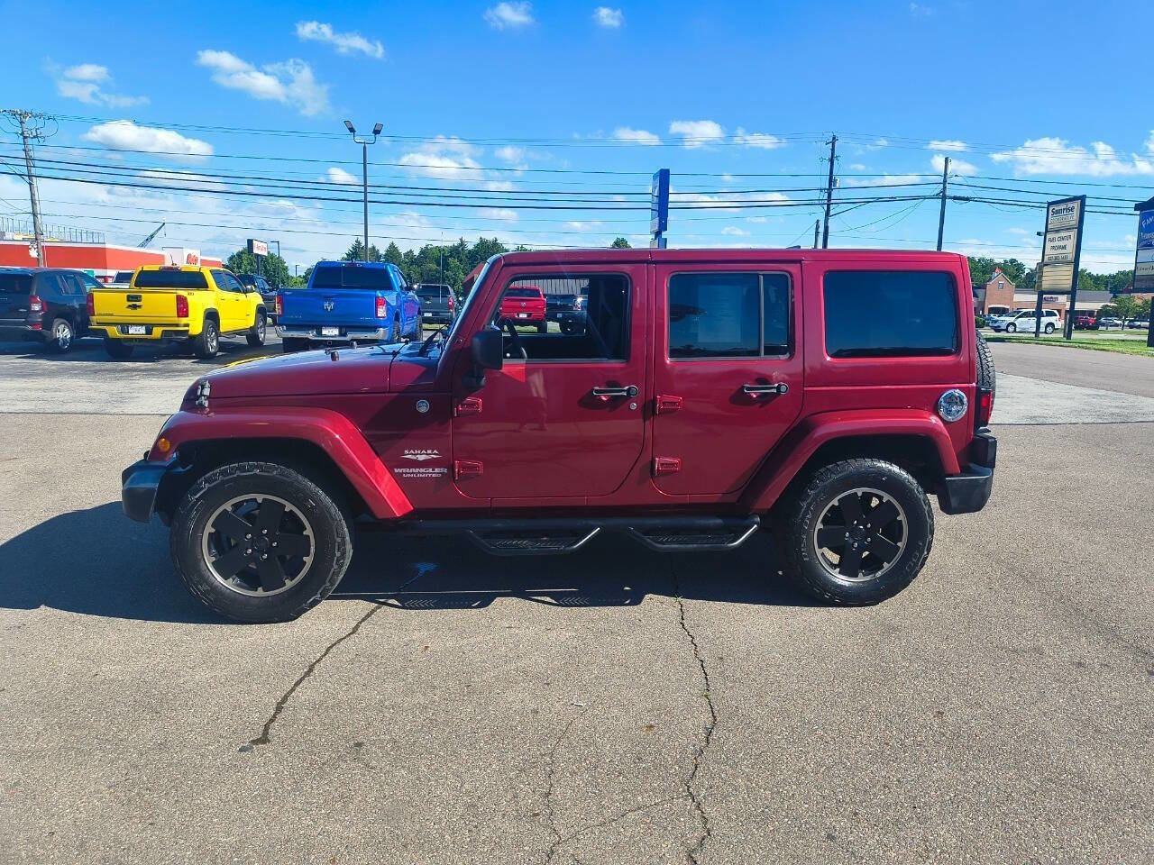Used 2011 Jeep Wrangler Unlimited Sahara w/ Dual Top Group AWD/4WD image 30