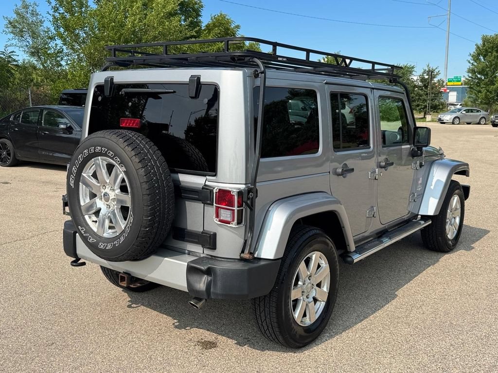 Used 2013 Jeep Wrangler Unlimited Sahara w/ Dual Top Group AWD/4WD image 4