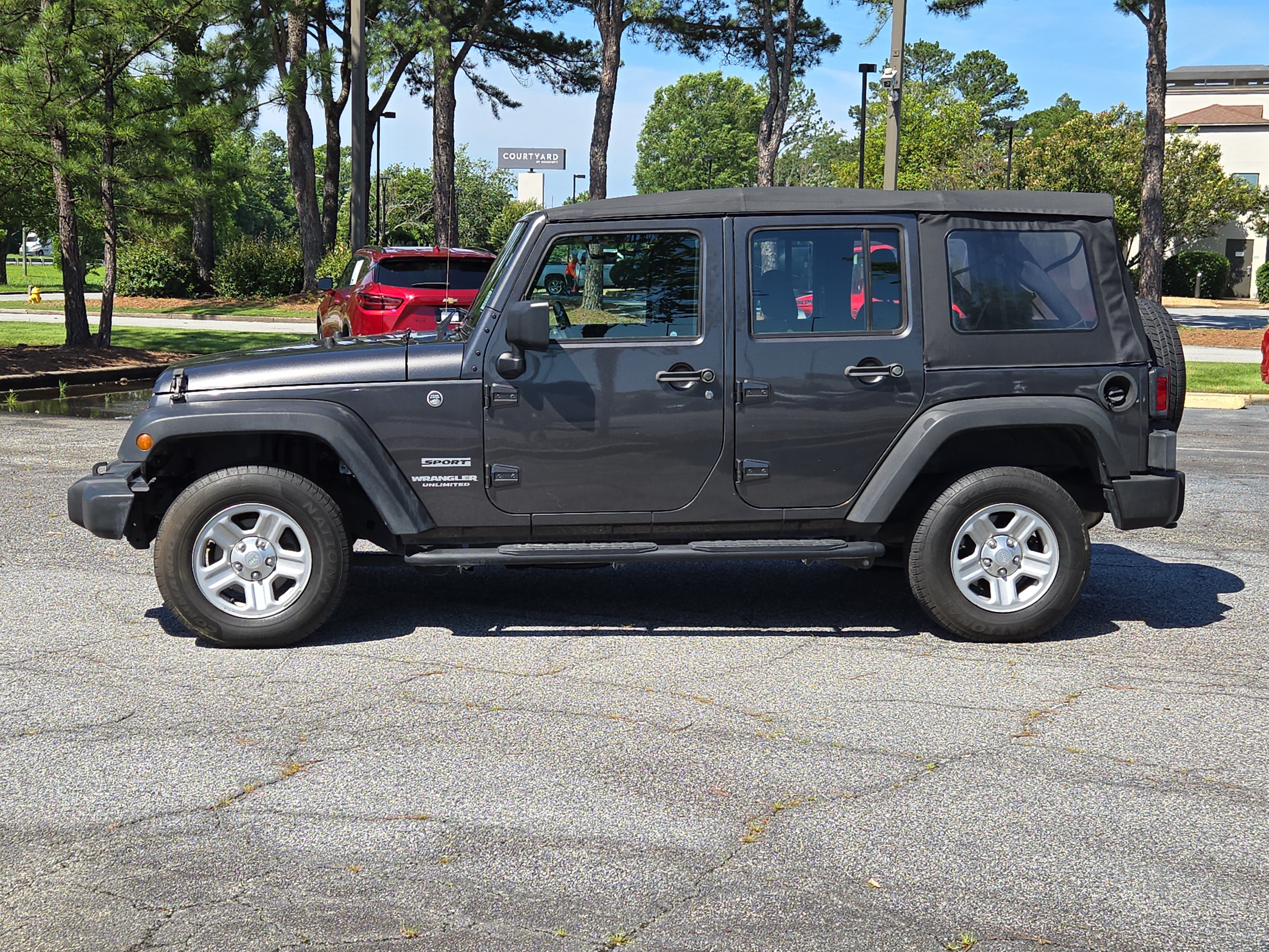 Used 2017 Jeep Wrangler Unlimited Sport w/ Connectivity Group AWD/4WD image 13