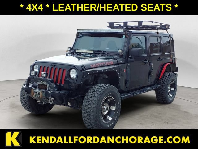 Used 2012 Jeep Wrangler Unlimited Sahara AWD/4WD video 1