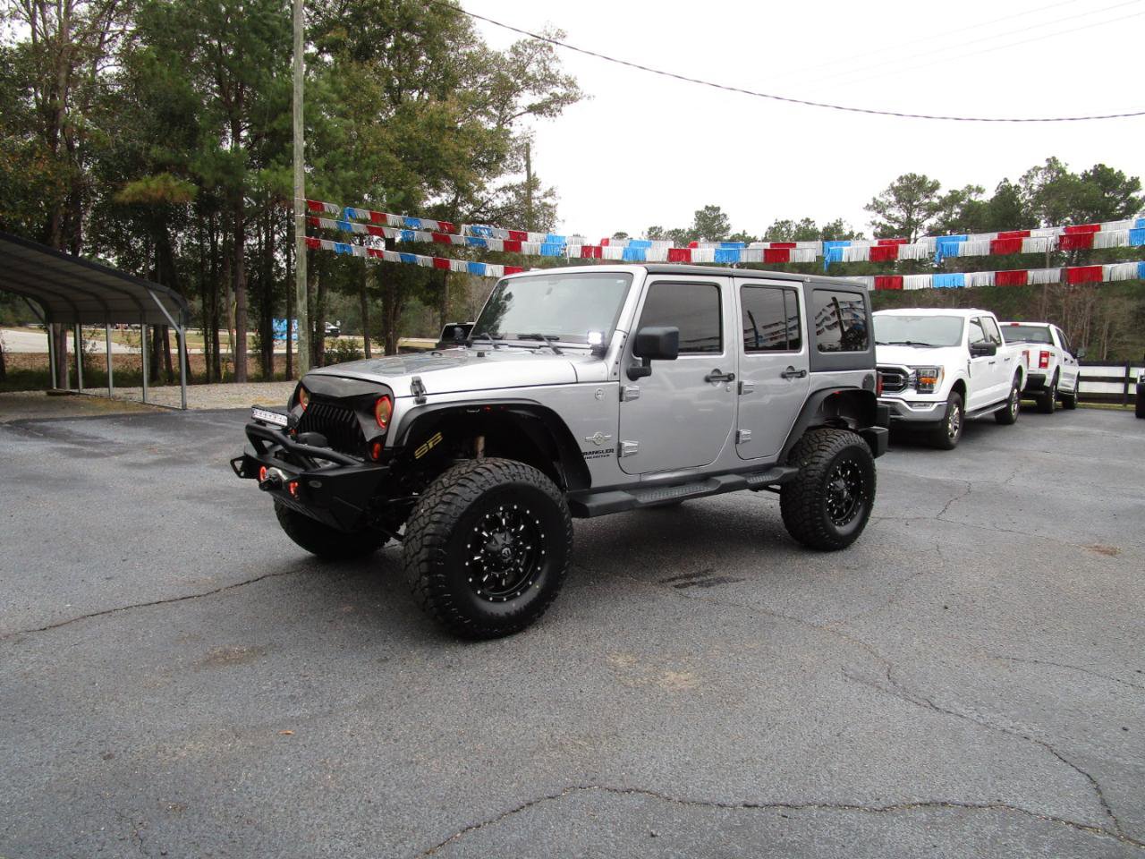 Used 2013 Jeep Wrangler Unlimited Sport AWD/4WD image 2