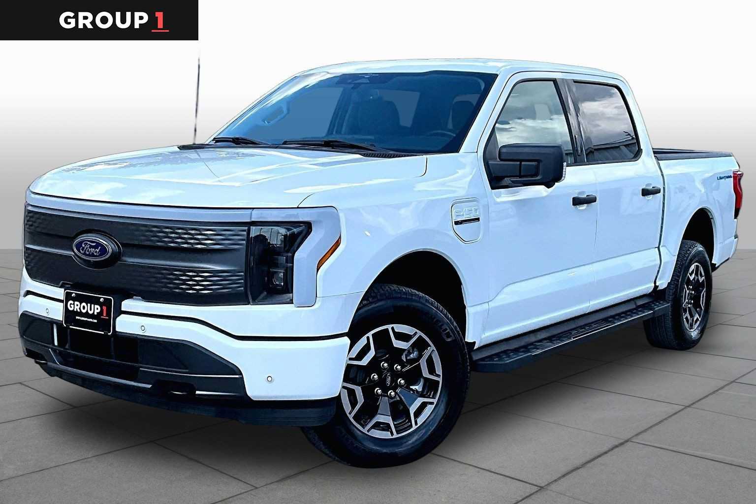 Used 2023 Ford F150 Lightning XLT AWD/4WD image 1