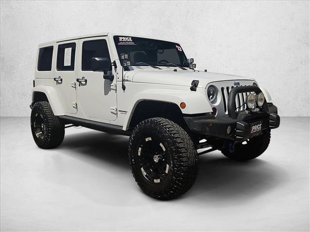 Used 2013 Jeep Wrangler Unlimited Sahara AWD/4WD video 3