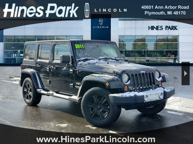 Used 2011 Jeep Wrangler Unlimited Sahara w/ Dual Top Group image 1