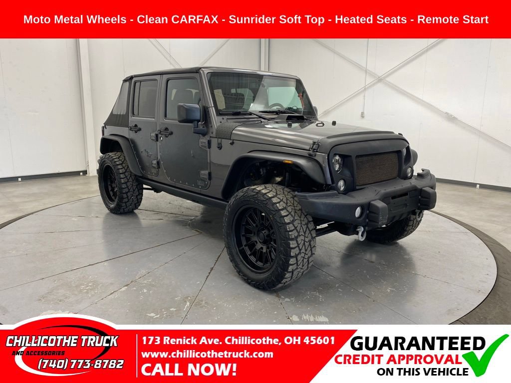 Used 2016 Jeep Wrangler Unlimited Sahara AWD/4WD image 1