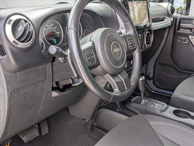Used 2014 Jeep Wrangler Unlimited Sahara AWD/4WD image 9
