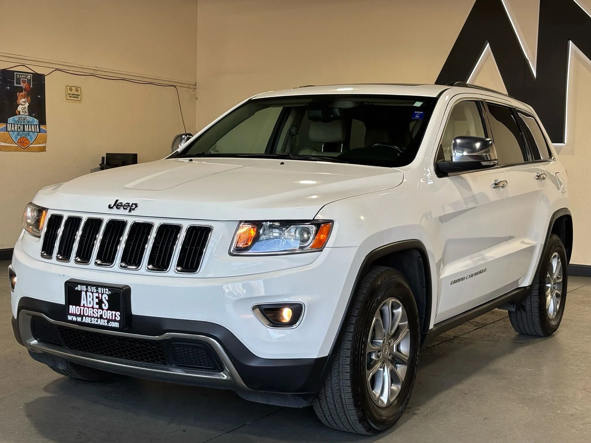 Used 2014 Jeep Grand Cherokee Limited AWD/4WD image 1