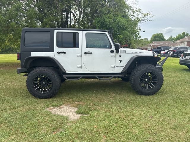 Used 2012 Jeep Wrangler Unlimited Sport AWD/4WD image 8