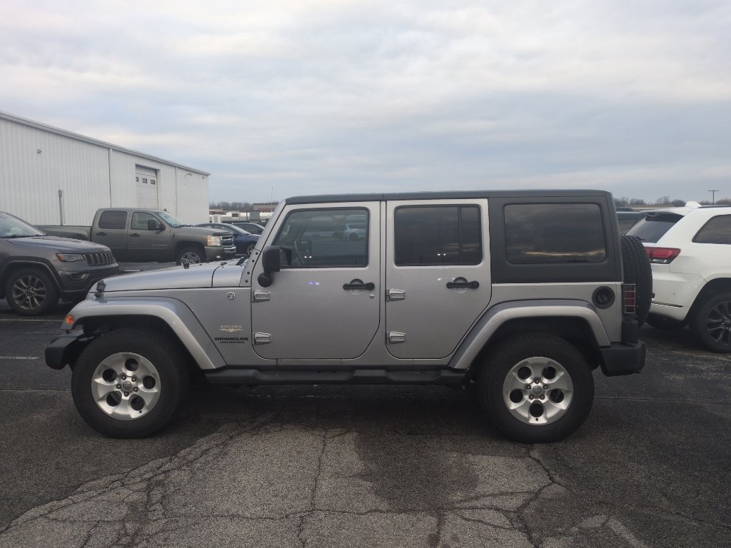 Used 2013 Jeep Wrangler Unlimited Sahara w/ Dual Top Group image 9