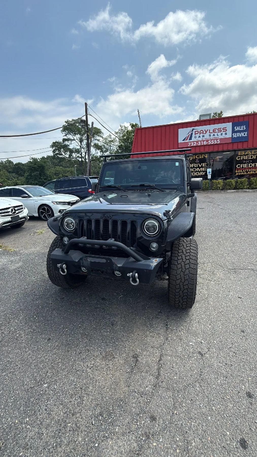 Used 2016 Jeep Wrangler Unlimited Sahara image 1