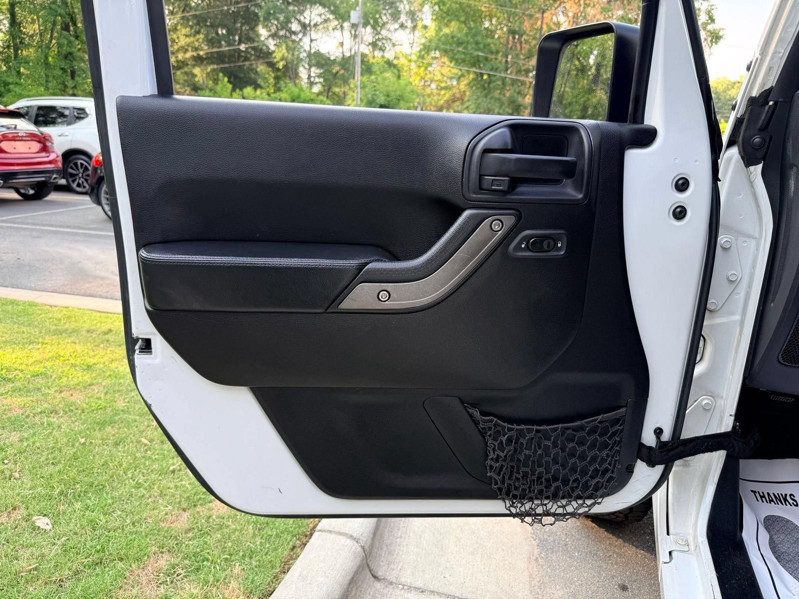 Used 2013 Jeep Wrangler Unlimited Sahara AWD/4WD image 19