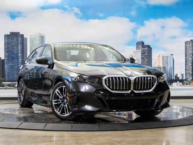 Used 2026 BMW 550e xDrive w/ Premium Package image 1