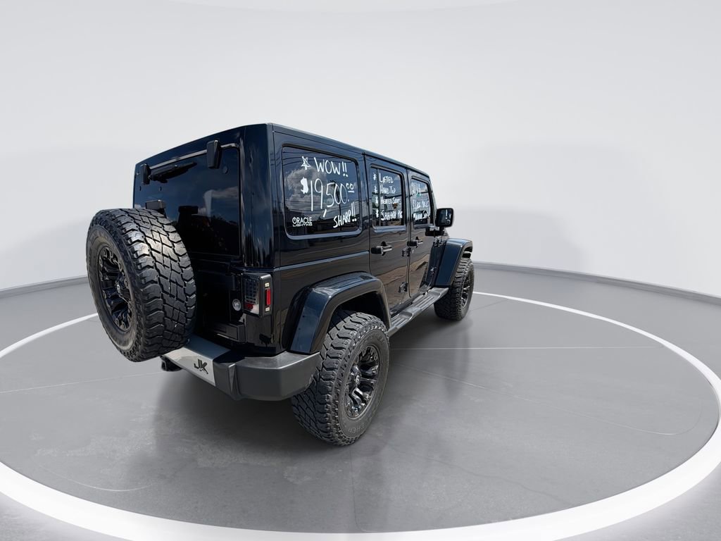 Used 2014 Jeep Wrangler Unlimited Sahara w/ Dual Top Group AWD/4WD image 9