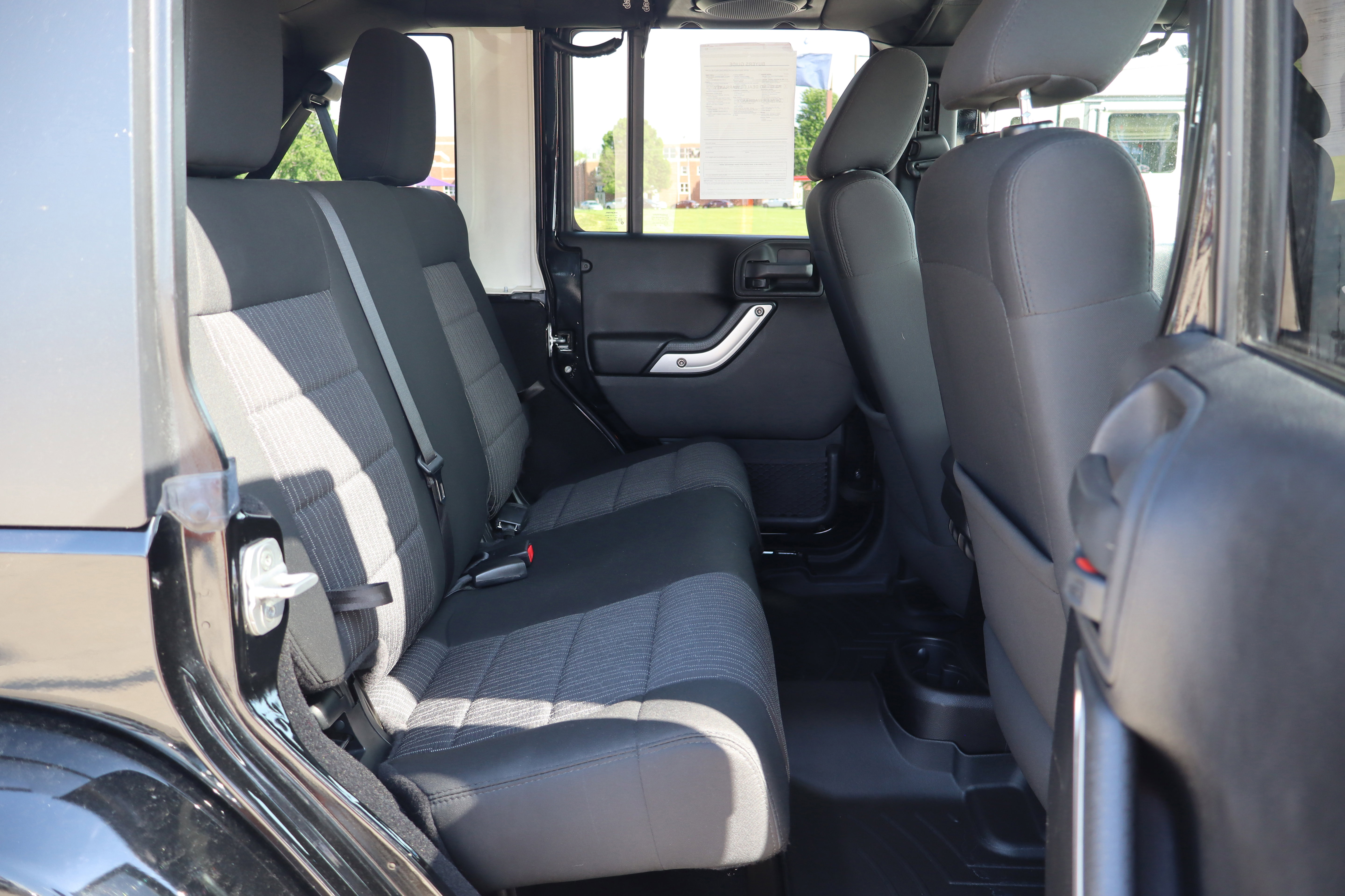 Used 2012 Jeep Wrangler Unlimited Sahara w/ Dual Top Group AWD/4WD image 11