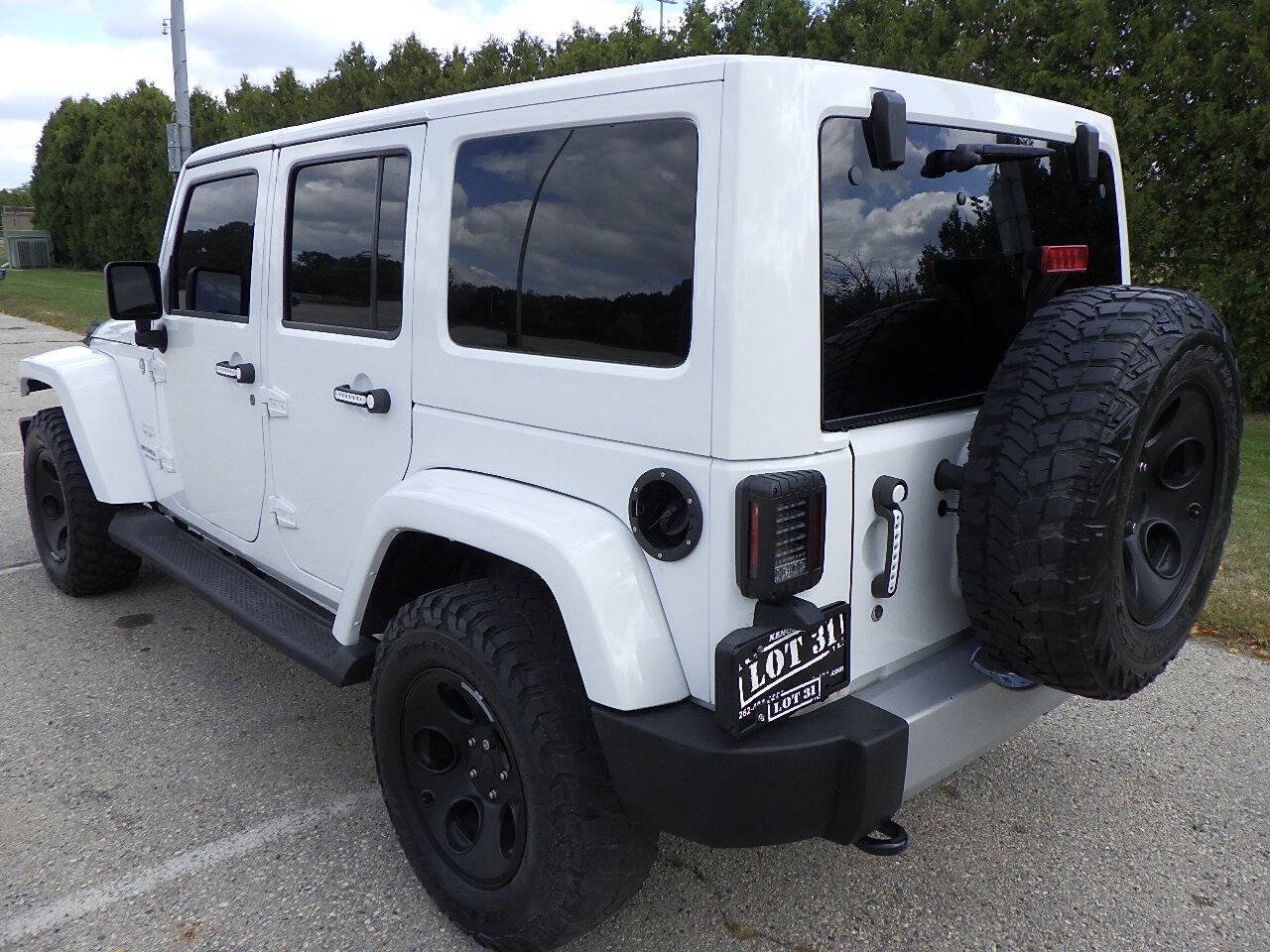 Used 2013 Jeep Wrangler Unlimited Sahara w/ Dual Top Group AWD/4WD image 3