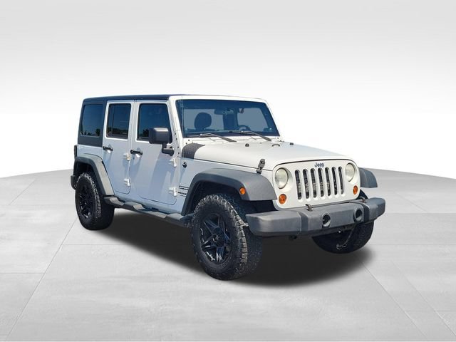 Used 2012 Jeep Wrangler Unlimited Sport AWD/4WD video 2
