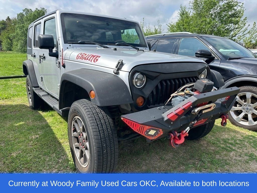 Used 2010 Jeep Wrangler Unlimited Sport AWD/4WD image 1