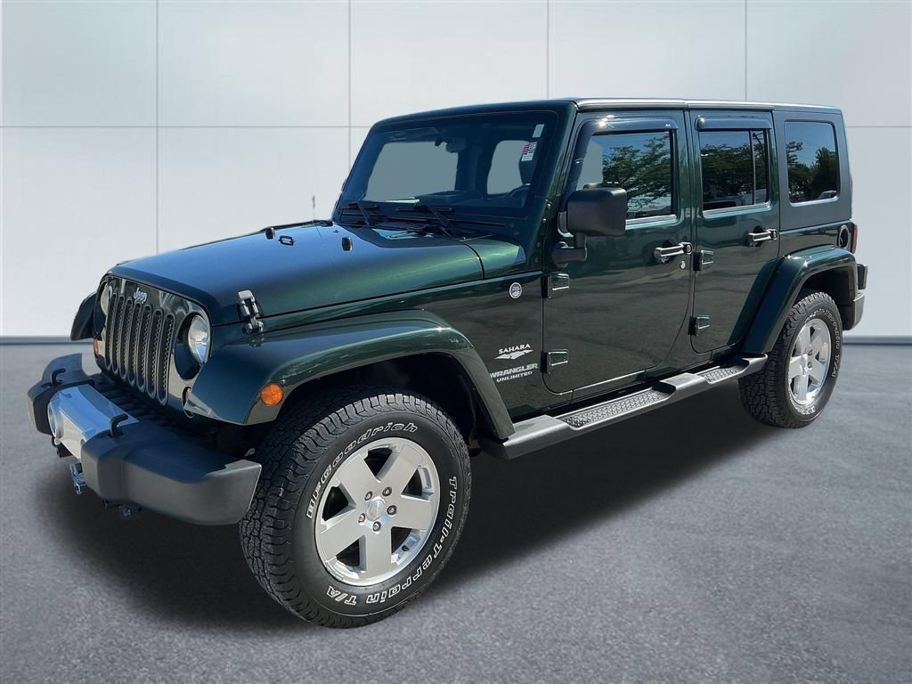 Used 2010 Jeep Wrangler Unlimited Sahara w/ Dual Top Group AWD/4WD video 2