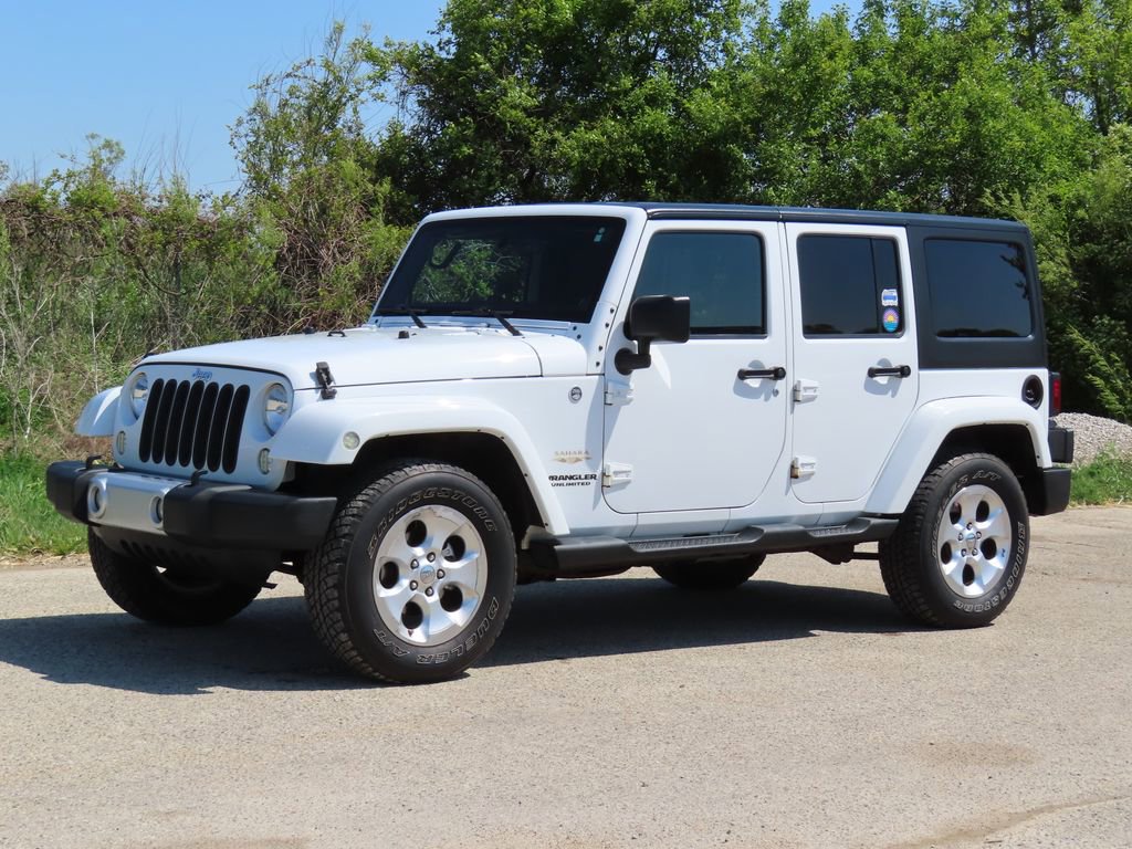 Used 2013 Jeep Wrangler Unlimited Sahara w/ Dual Top Group AWD/4WD image 8