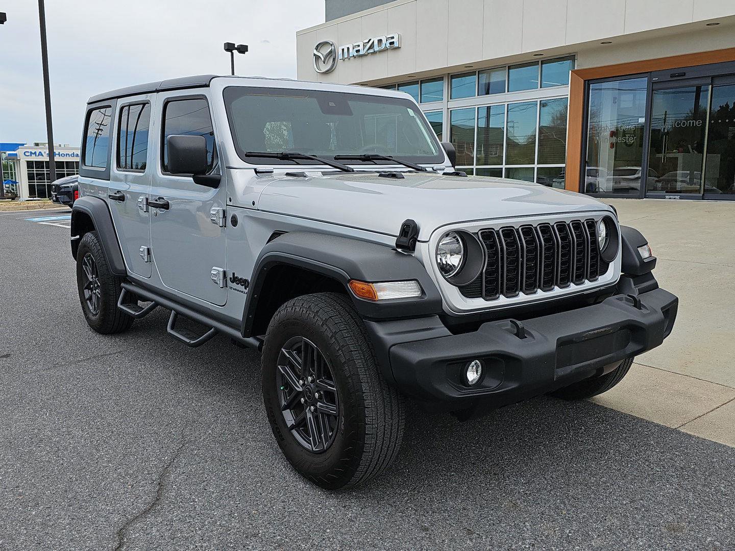 Used 2024 Jeep Wrangler Sport S image 1