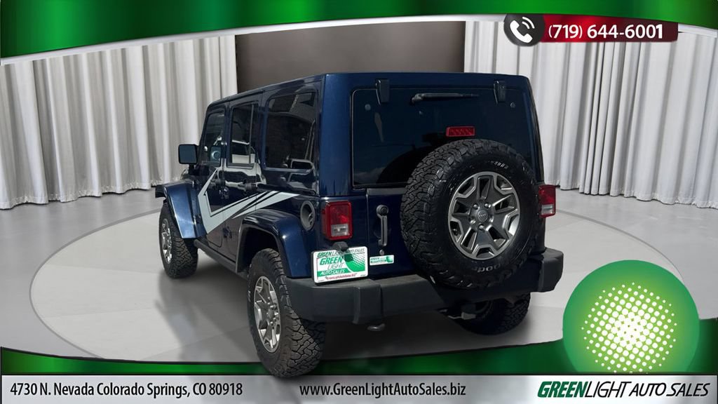 Used 2013 Jeep Wrangler Unlimited Rubicon w/ Dual Top Group AWD/4WD image 3