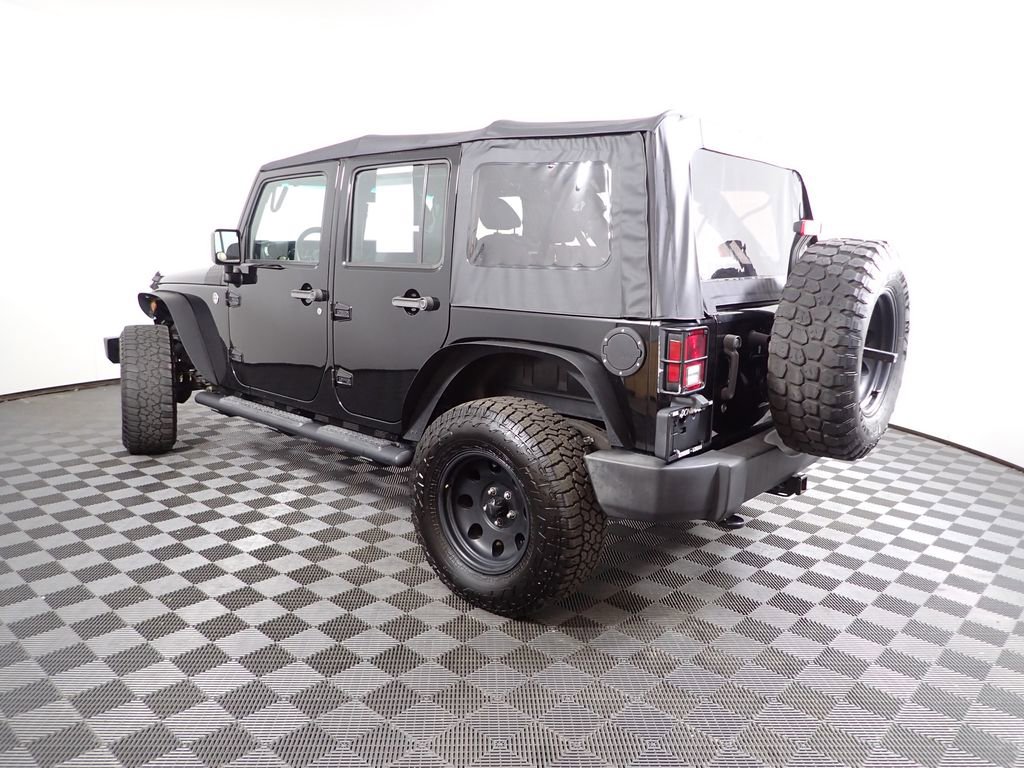 Used 2017 Jeep Wrangler Unlimited Sport w/ Mopar Black Appearance Group AWD/4WD image 16