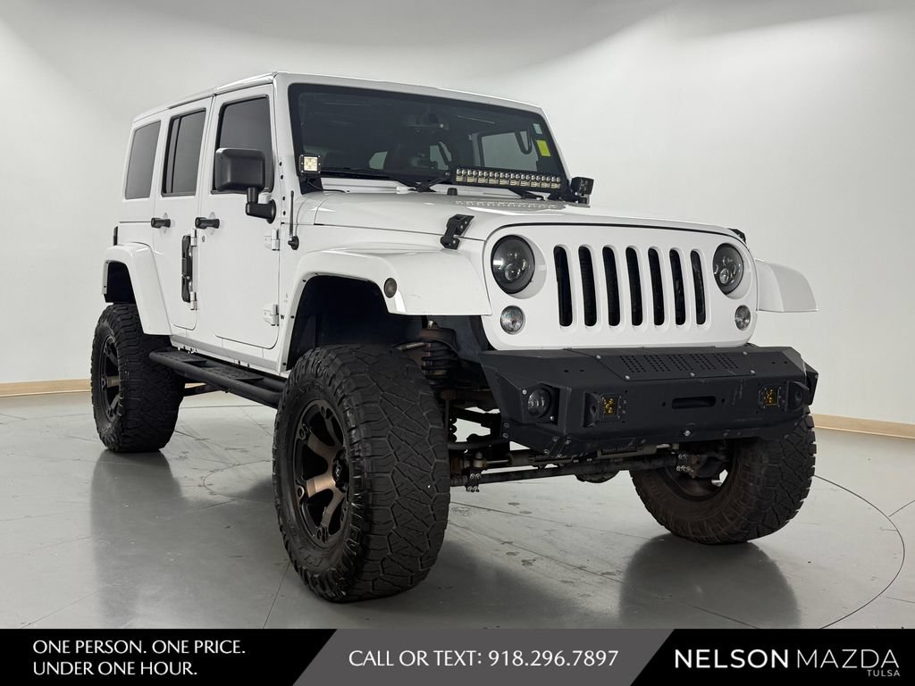 Used 2014 Jeep Wrangler Unlimited Sahara w/ Mopar Chrome Edition Group AWD/4WD image 4