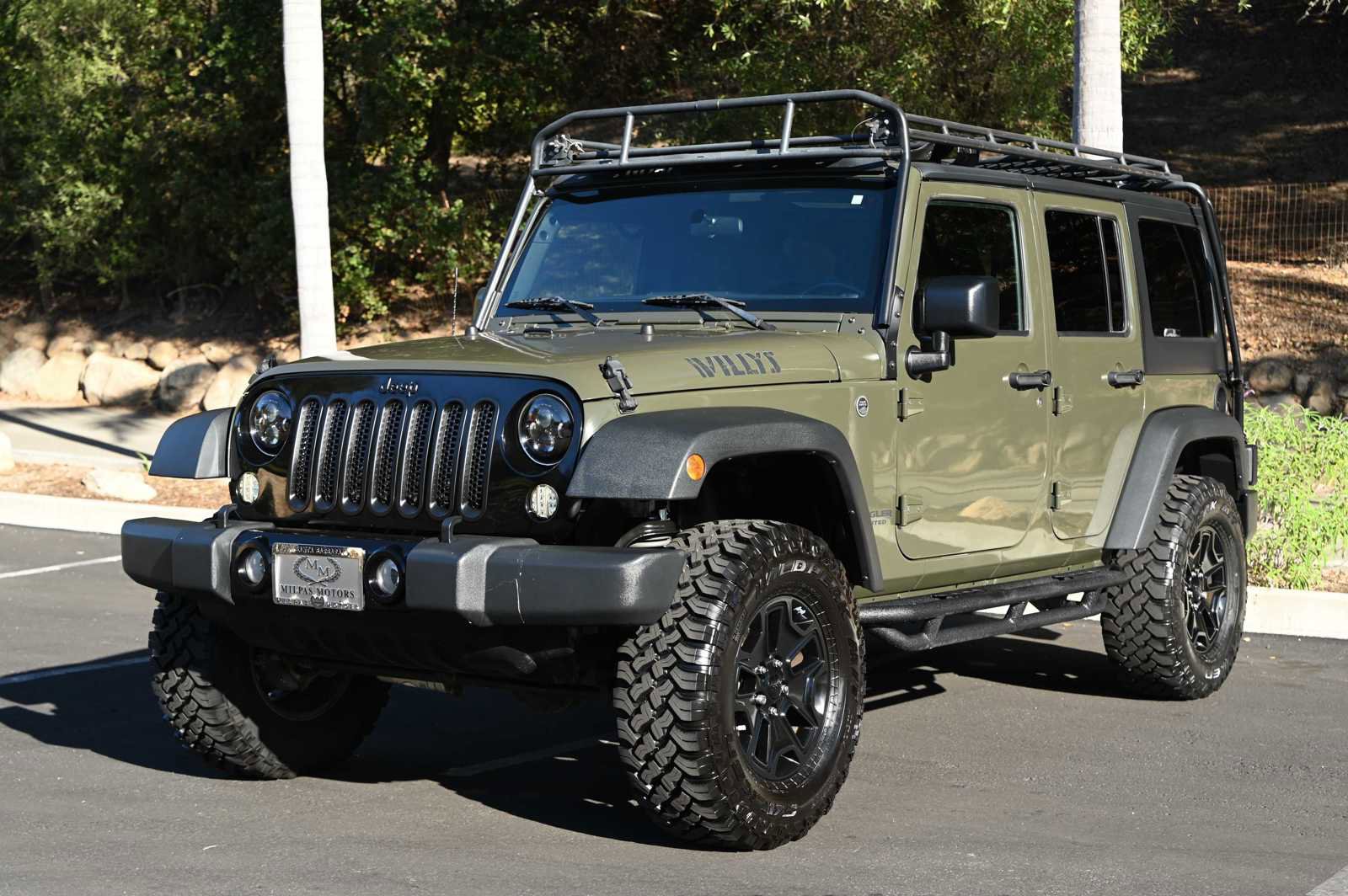 Used 2016 Jeep Wrangler Unlimited Sport image 1