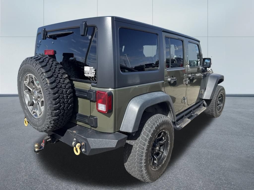 Used 2015 Jeep Wrangler Unlimited Rubicon w/ Max Tow Package AWD/4WD video 2