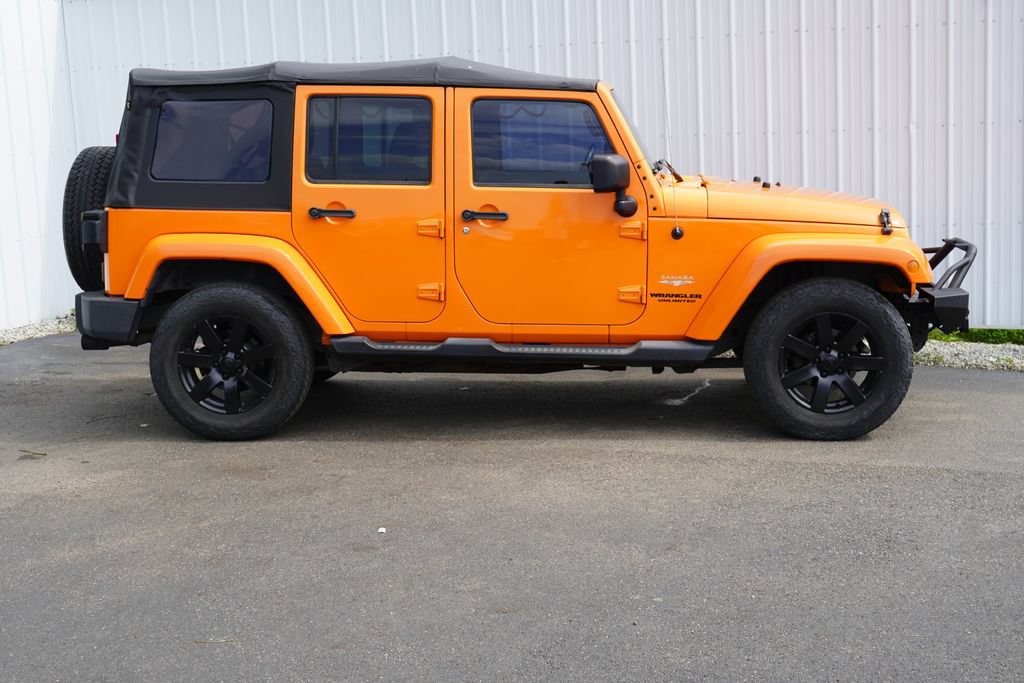 Used 2012 Jeep Wrangler Unlimited Sahara w/ Dual Top Group AWD/4WD image 2