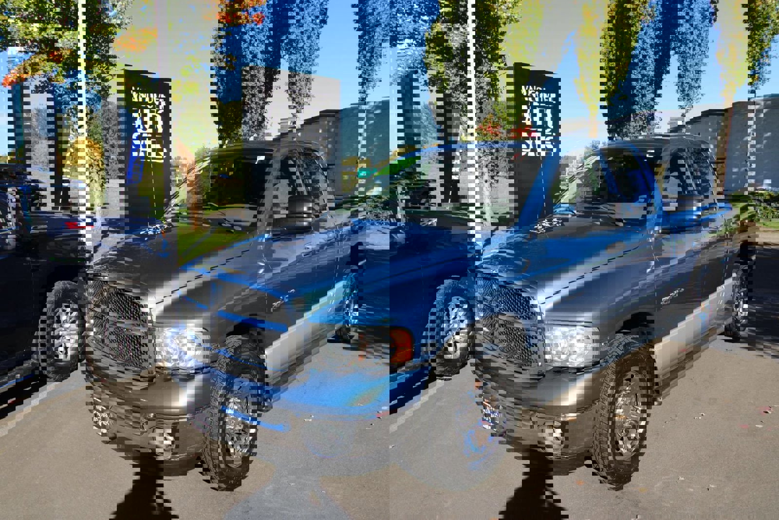 Used 2004 Dodge Ram 1500 Truck SLT w/ Big Horn Quad Cab Value Group image 1