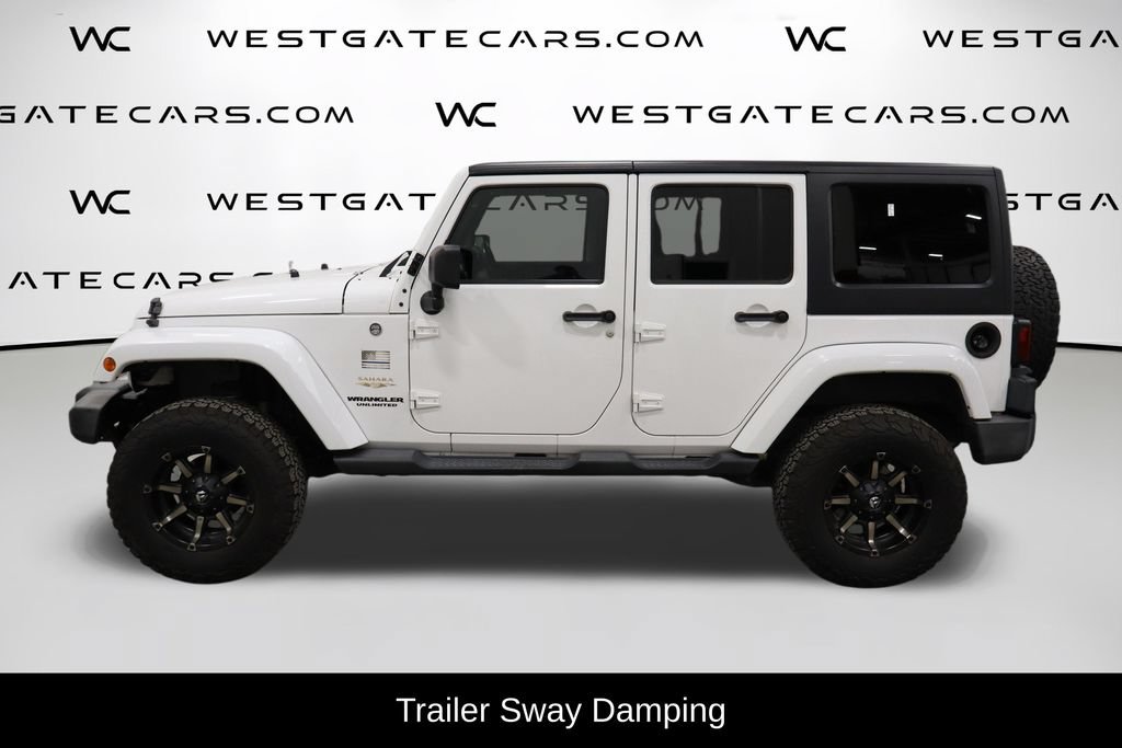 Used 2012 Jeep Wrangler Unlimited Sahara w/ Max Tow Pkg AWD/4WD image 5