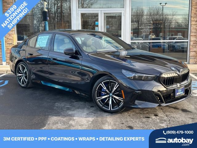 Used 2025 BMW 550e xDrive w/ Premium Package image 1