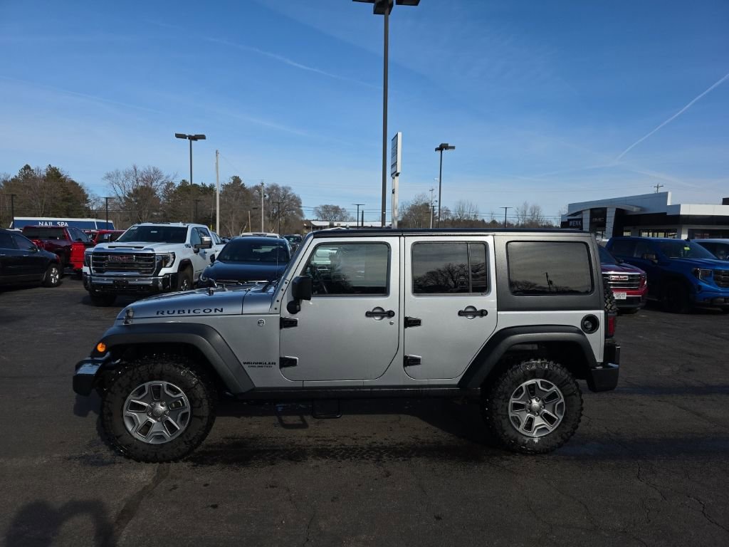 Used 2014 Jeep Wrangler Unlimited Rubicon w/ Dual Top Group