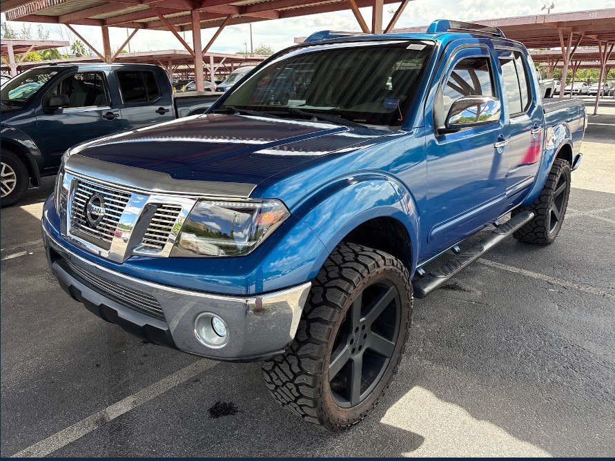 Used 2009 Nissan Frontier LE RWD image 1