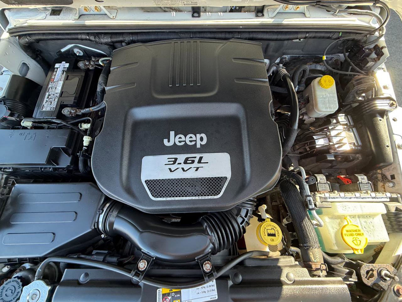 Used 2013 Jeep Wrangler Unlimited Sahara w/ Mopar Chrome Edition Group AWD/4WD image 16