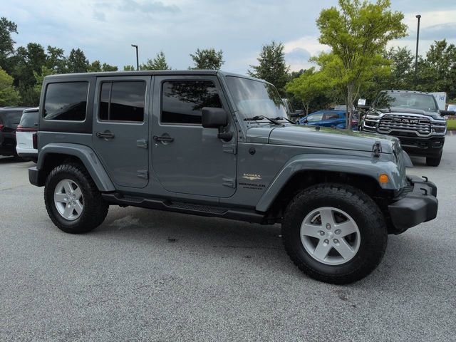 Used 2014 Jeep Wrangler Unlimited Sahara w/ Dual Top Group AWD/4WD video 1
