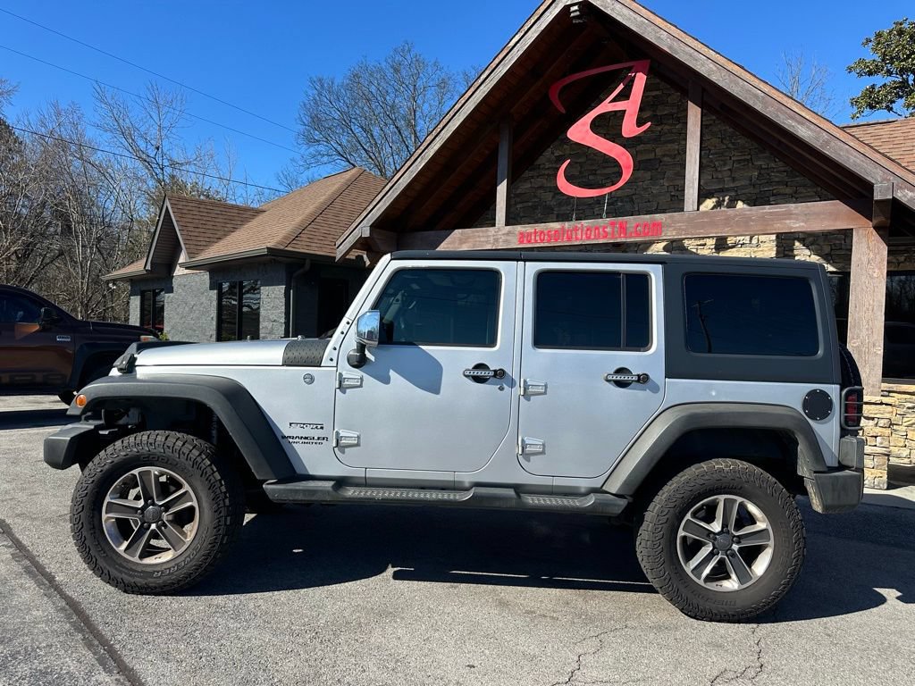 Used 2011 Jeep Wrangler Unlimited Sport AWD/4WD image 2