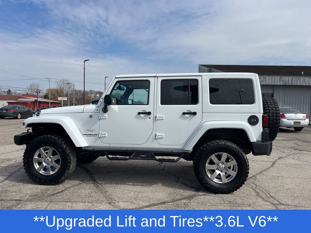 Used 2013 Jeep Wrangler Unlimited Sahara w/ Dual Top Group image 2