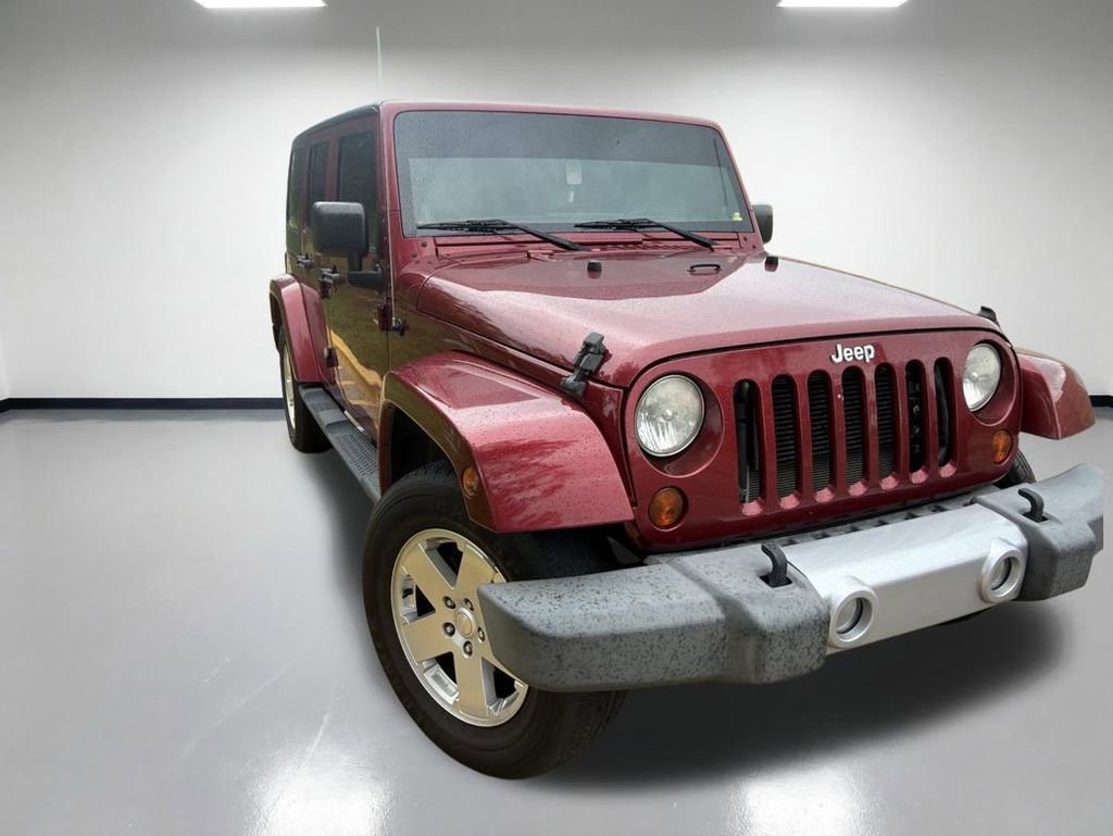 Used 2012 Jeep Wrangler Unlimited Sahara w/ Connectivity Group AWD/4WD image 2