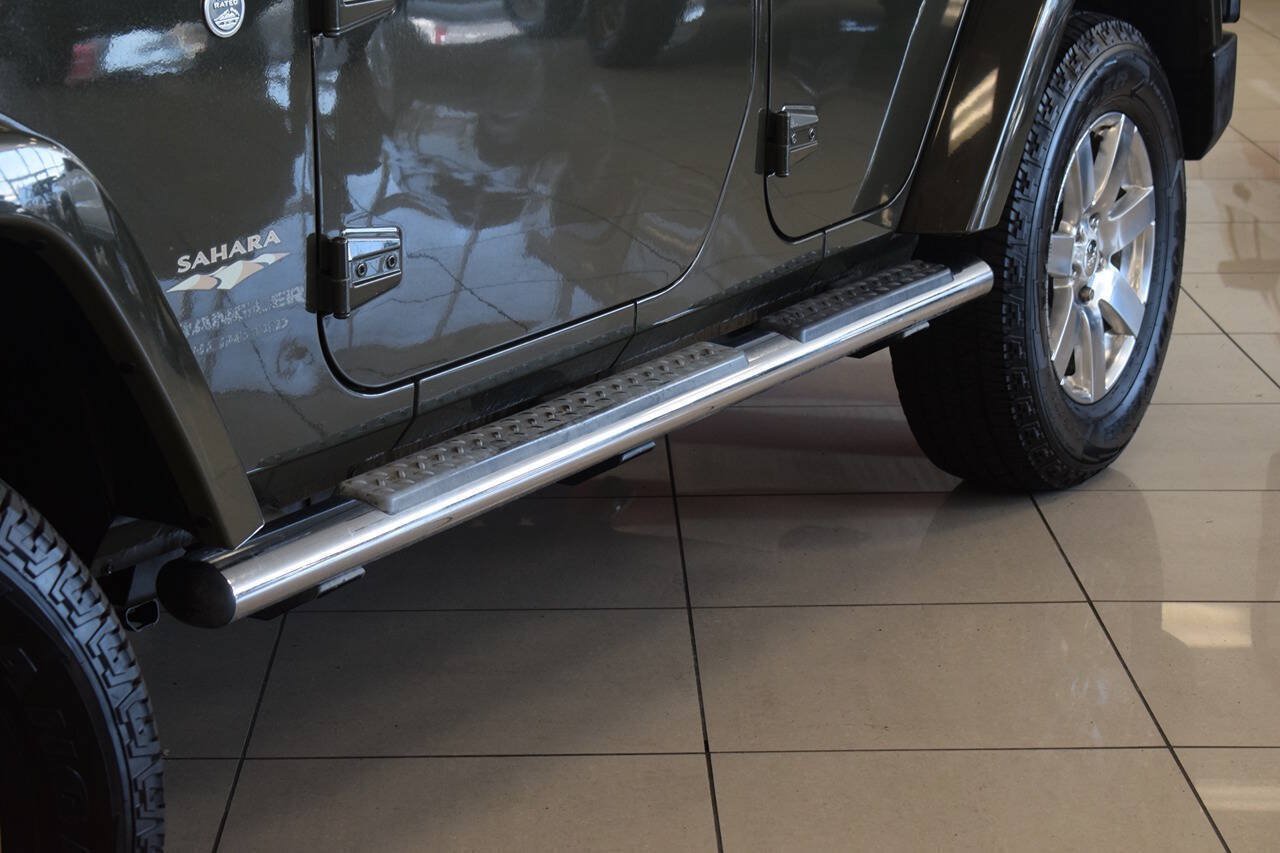 Used 2015 Jeep Wrangler Unlimited Sahara w/ Dual Top Group AWD/4WD image 17