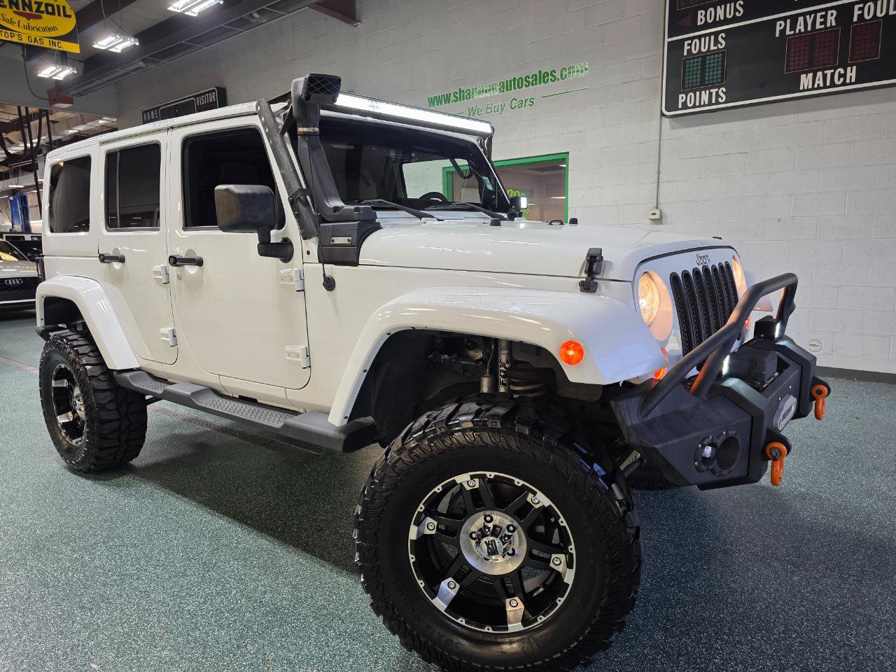 Used 2013 Jeep Wrangler Unlimited Sahara w/ Dual Top Group AWD/4WD image 14