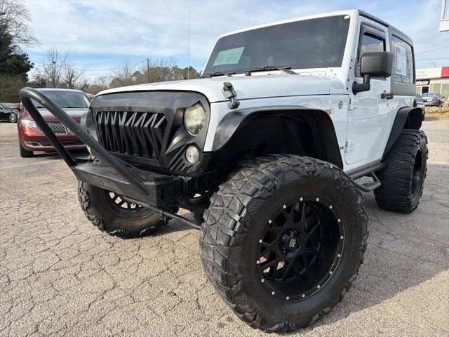 Used 2014 Jeep Wrangler Freedom Edition w/ Connectivity Group AWD/4WD image 1