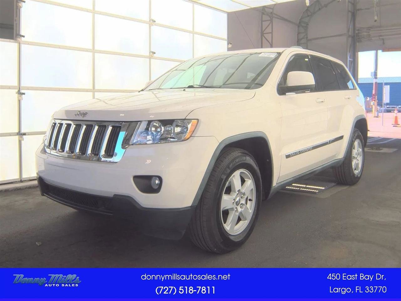 Used 2012 Jeep Grand Cherokee Laredo w/ Laredo E Group AWD/4WD image 1